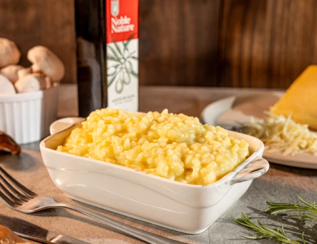 Risoto de queijos cremoso com emmental, muçarela e parmesão — delivery Rei do Parmegiana